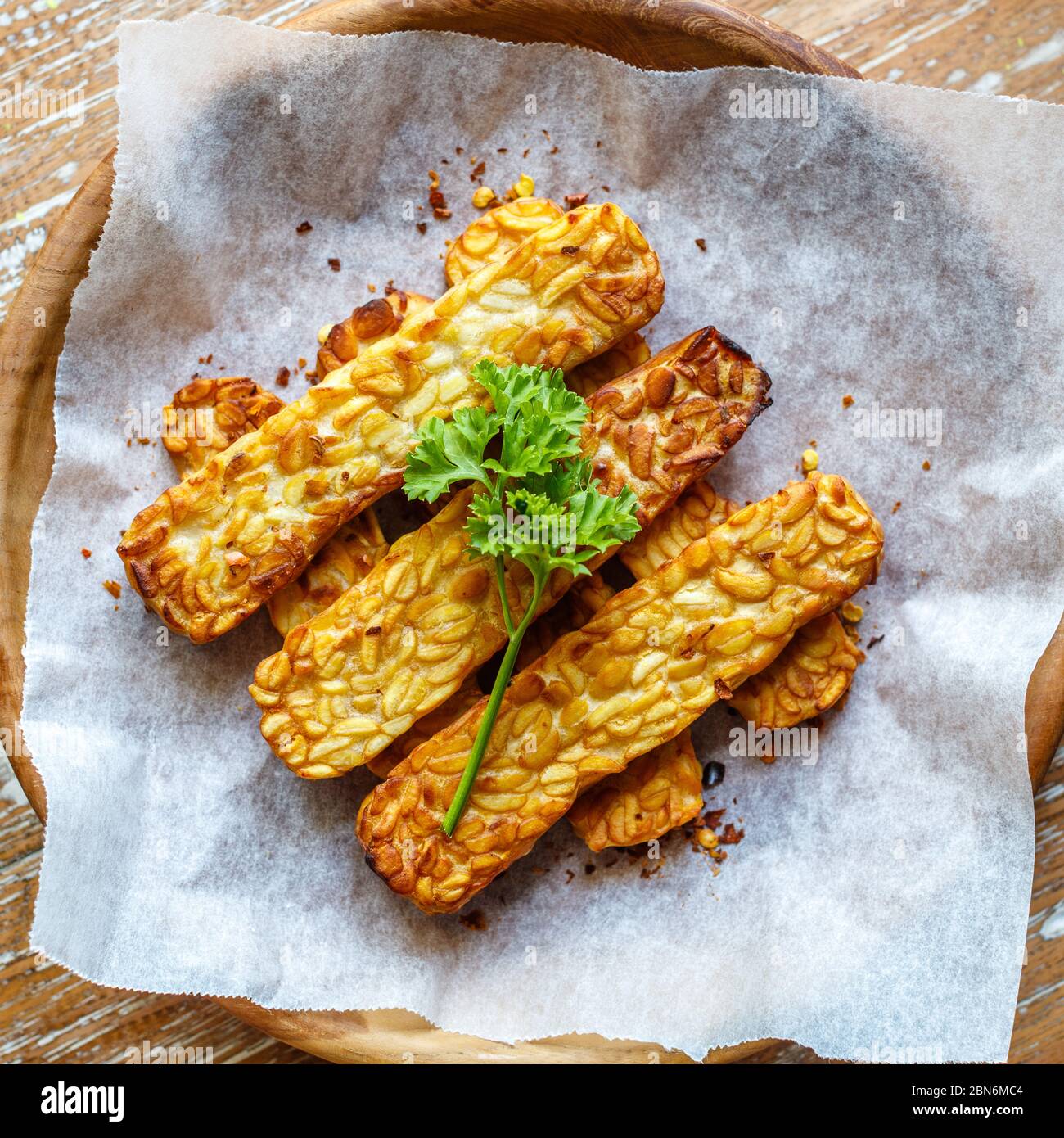 Fried Tempeh Traditional Indonesian Soy Product And Parsley Top View Square Image Stock Photo Alamy