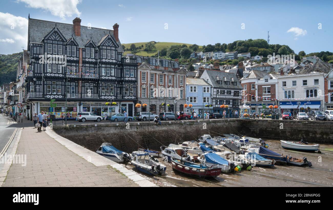 Dartmouth's inner harbour at low tide surrounded by attractive old buildings, Devon, England, UK Stock Photo
