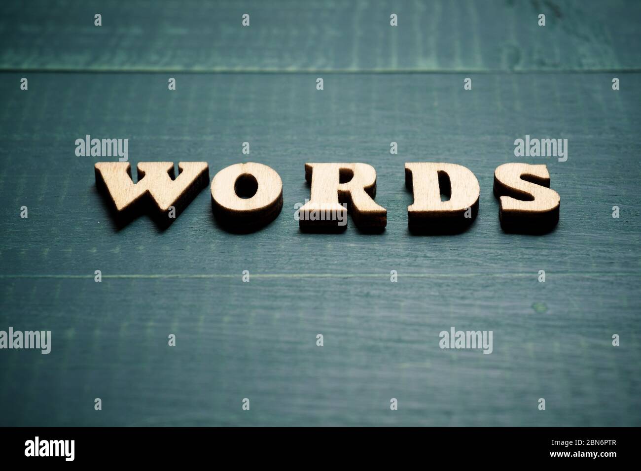 Words text on a wood table. Stock Photo