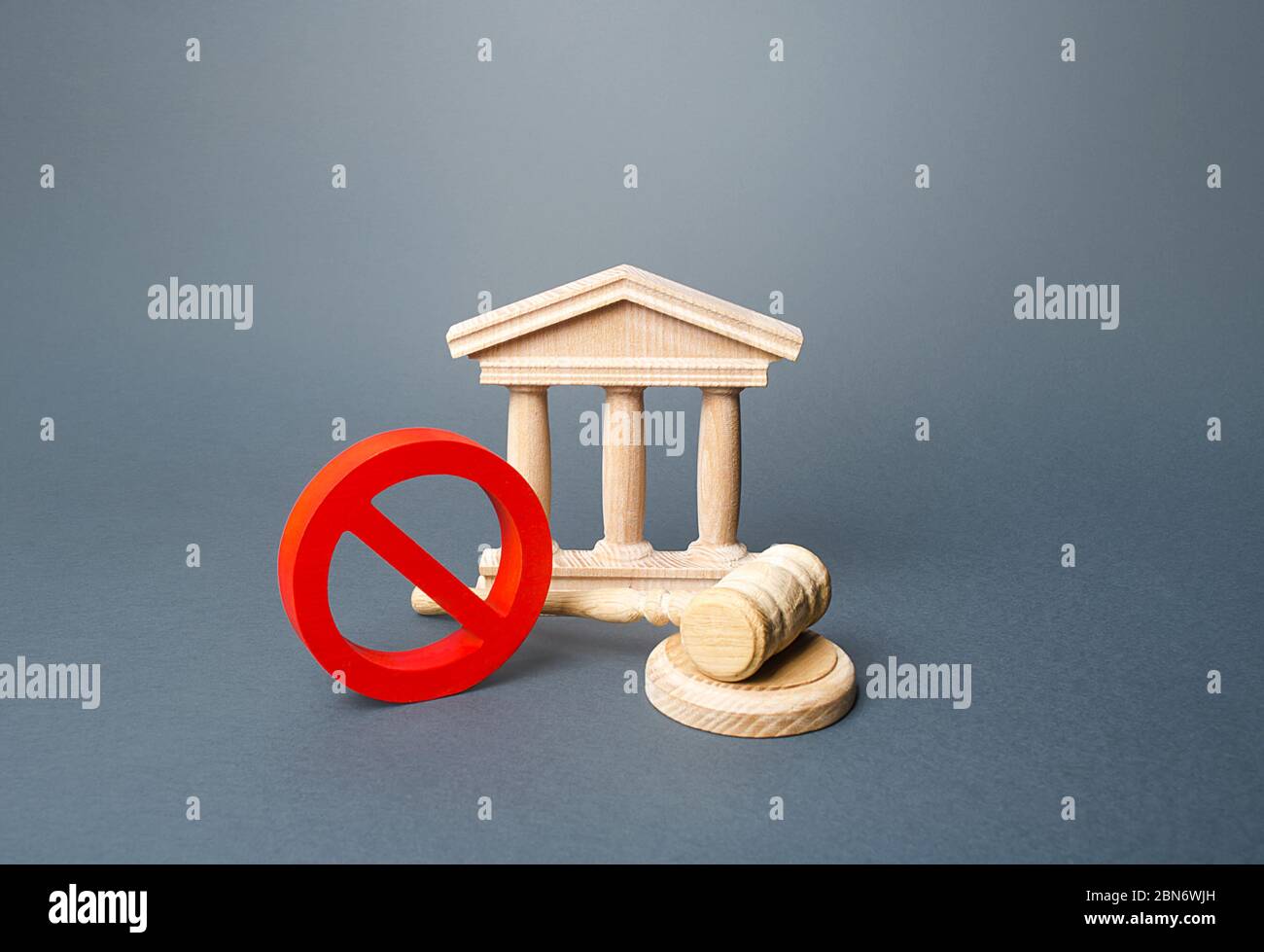 Courthouse and red prohibition sign NO. Quarantine restrictive measures. Partial restriction of the rights and freedoms of citizens. Ban on work of no Stock Photo