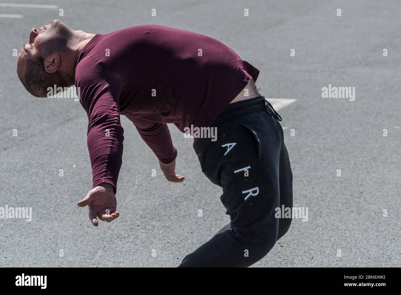 A man bending over backwards. Stock Photo