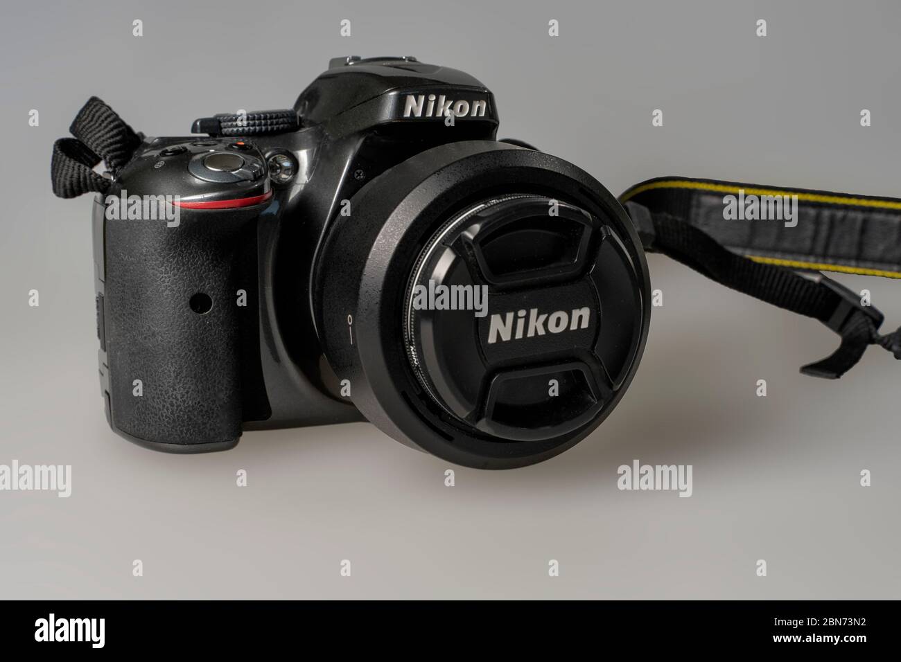 Russia, Moscow, 03 13 2020 Nikon 5600 camera on a gray background Stock Photo