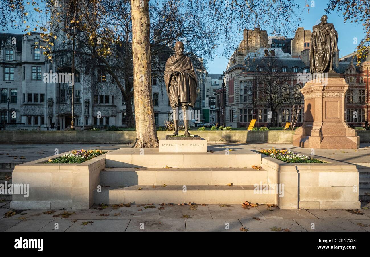 Mahatma Gandhi; statue of the Indian activist and political leader situated outside the Palace of Westminster in Parliament Square, London. Stock Photo