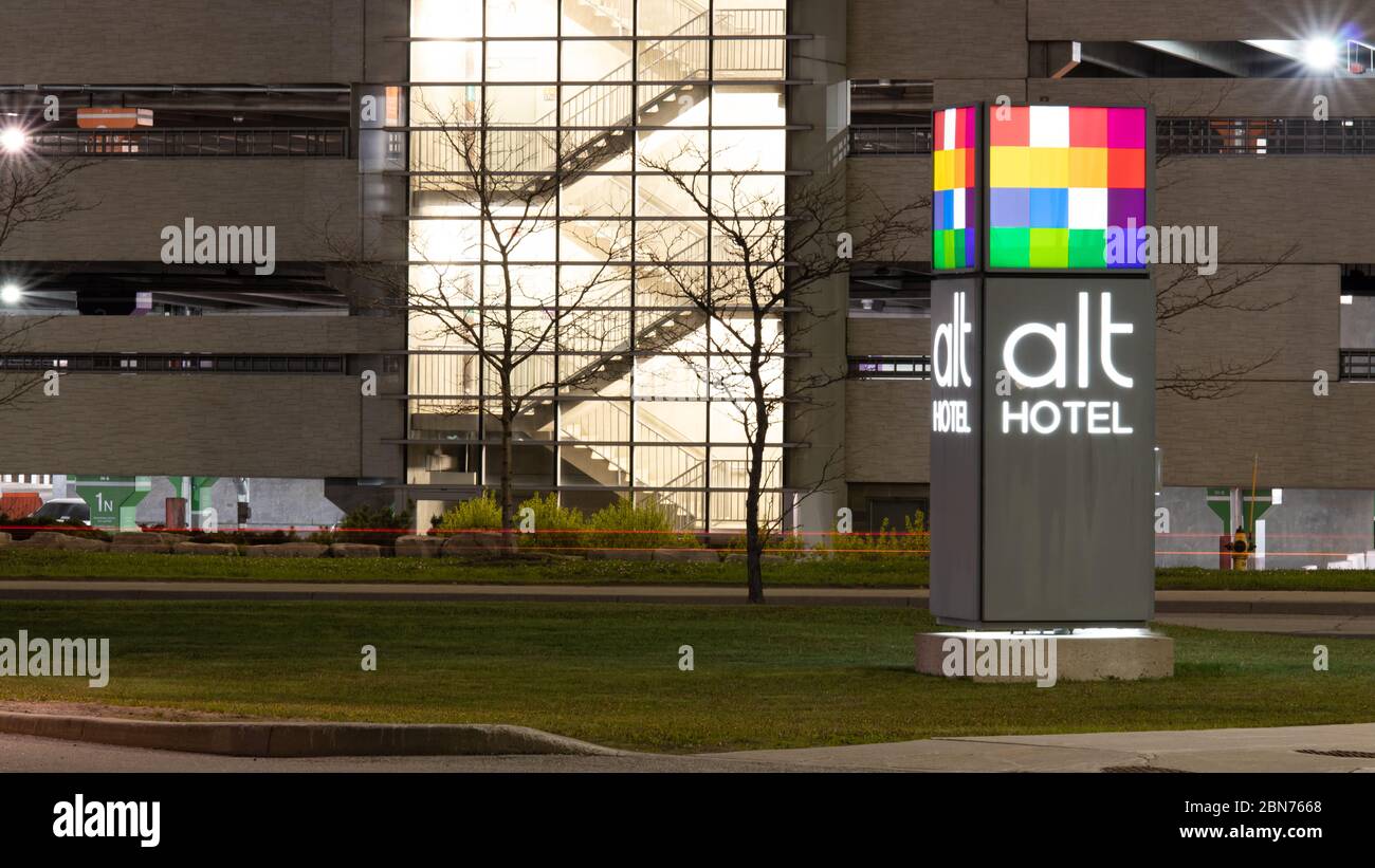 alt Hotel logo out-front of a hotel location, shot at night near Toronto Pearson Airport. Stock Photo