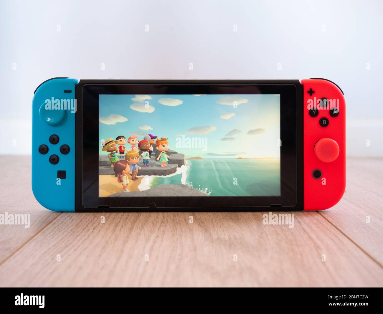 May 2020, UK: Nintendo switch animal crossing new horizons online gameplay  white studio background Stock Photo - Alamy