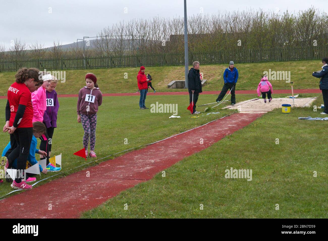 Girls junior long jump competition Stock Photo