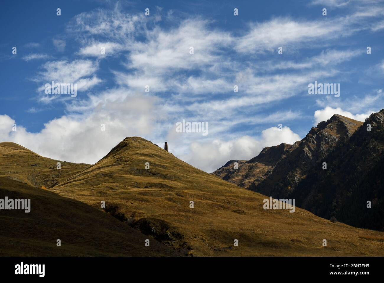Caucasus, Georgia, Tusheti region, Dartlo. Medieval tower against a mountain landscape in Tusheti region Stock Photo