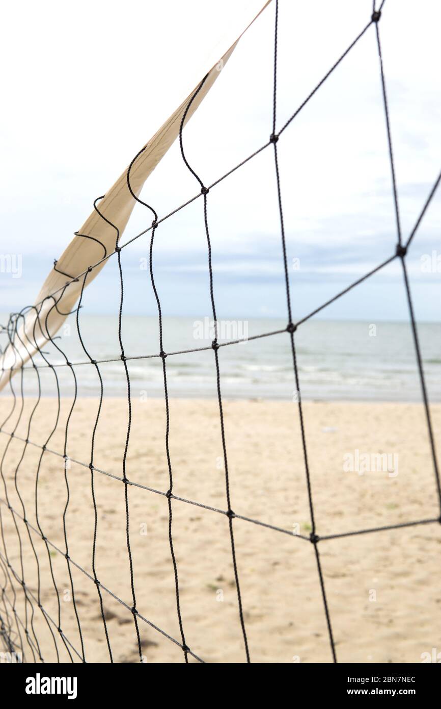 Close up of beach volleyball net on the beach. Sports equipment Stock