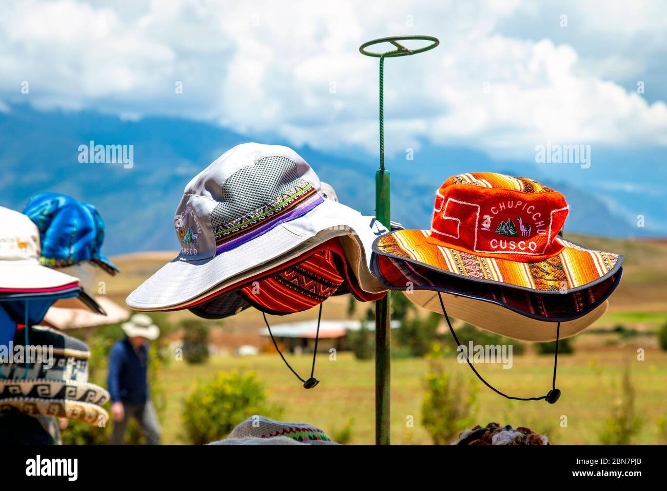 Souvenir bushmaster hats for sale at a stall in Moray, Sacred Valley, Peru Stock Photo