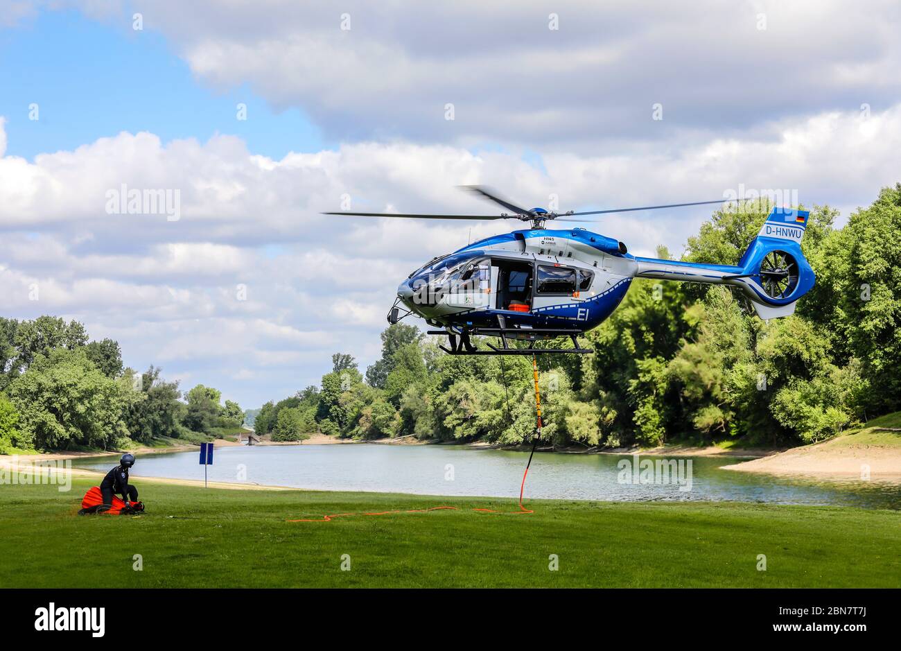 Duesseldorf, North Rhine-Westphalia, Germany - Helicopter Airbus H145 of the police flying squadron during an exercise with the new 820 liter fire-fig Stock Photo