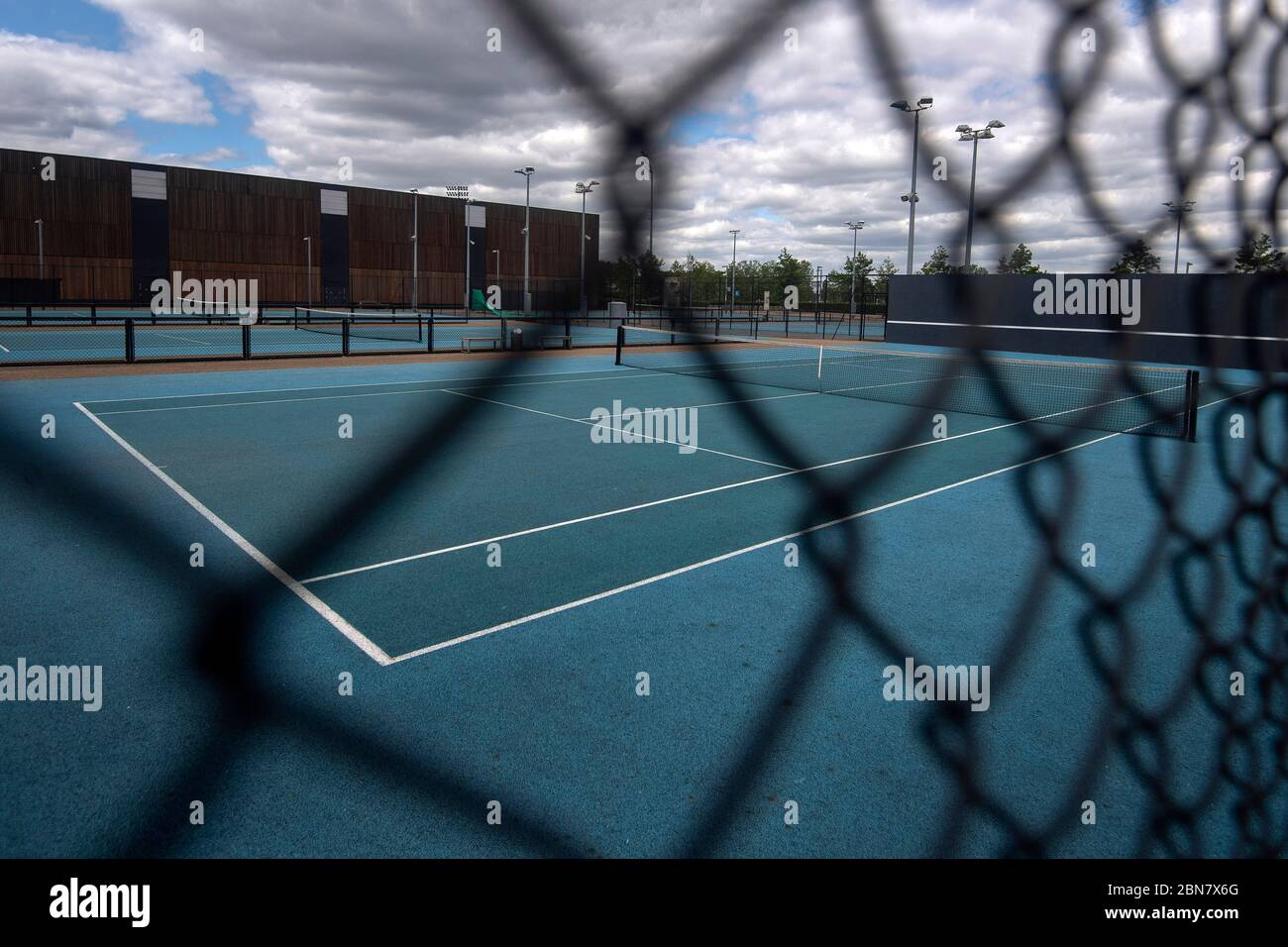 Tennis courts remain locked and empty in Battersea Park, London, after the  introduction of measures to bring the country out of lockdown Stock Photo -  Alamy