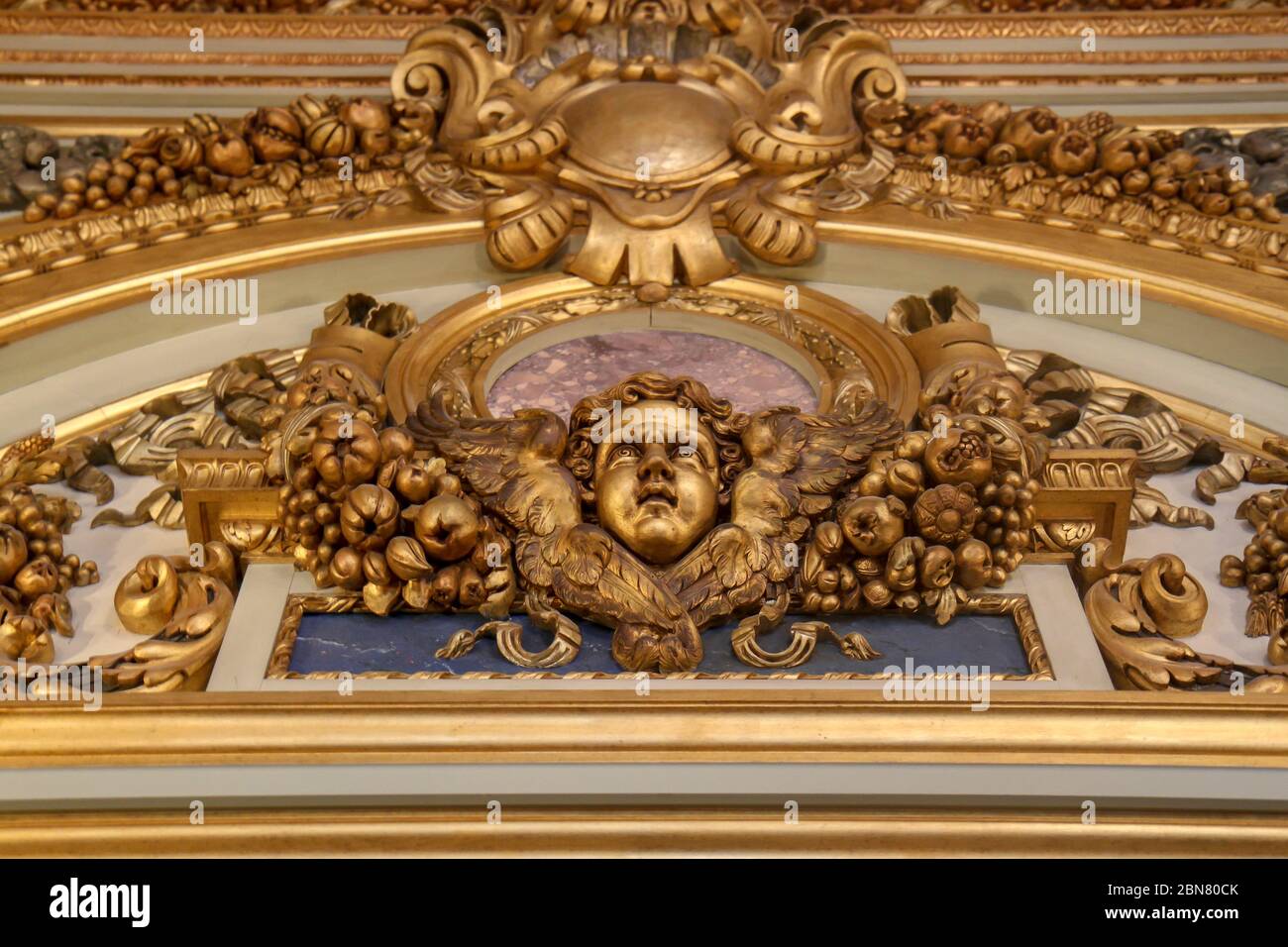Ornate details over a doorway at The Breakers mansion, Newport, Rhode Island, United States Stock Photo