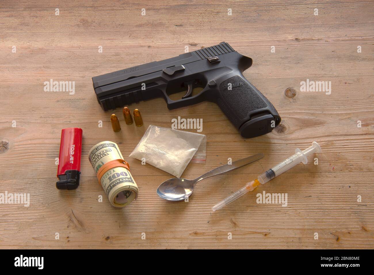 Drugs paraphernalia with a Sig Sauer P250 automatic pistol Stock Photo
