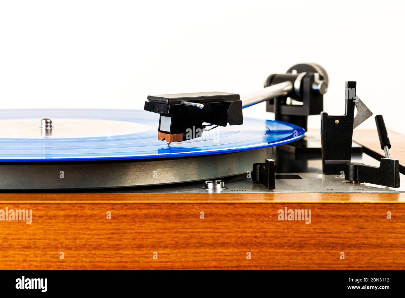 Close up of vintage turntable vinyl record player isolated on white ...