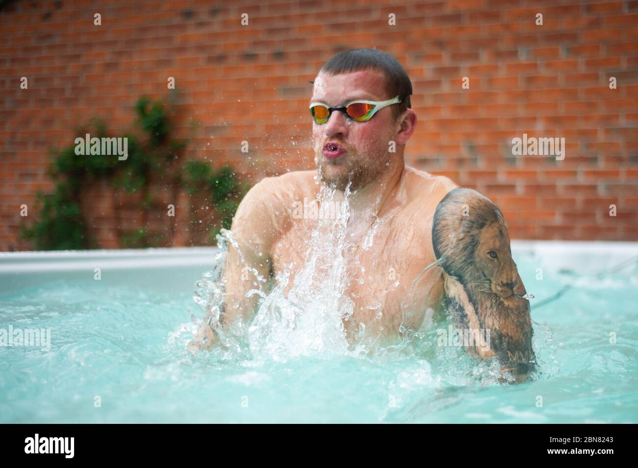 British swimmer Adam Peaty trains at his house in Loughborough in pool provided by Jacuzzi in partnership with Bedfordshire Hot Tubs to allow our GB Olympic Swimmers to continue to train at home for Tokyo 2021 during the current UK lockdown. Stock Photo