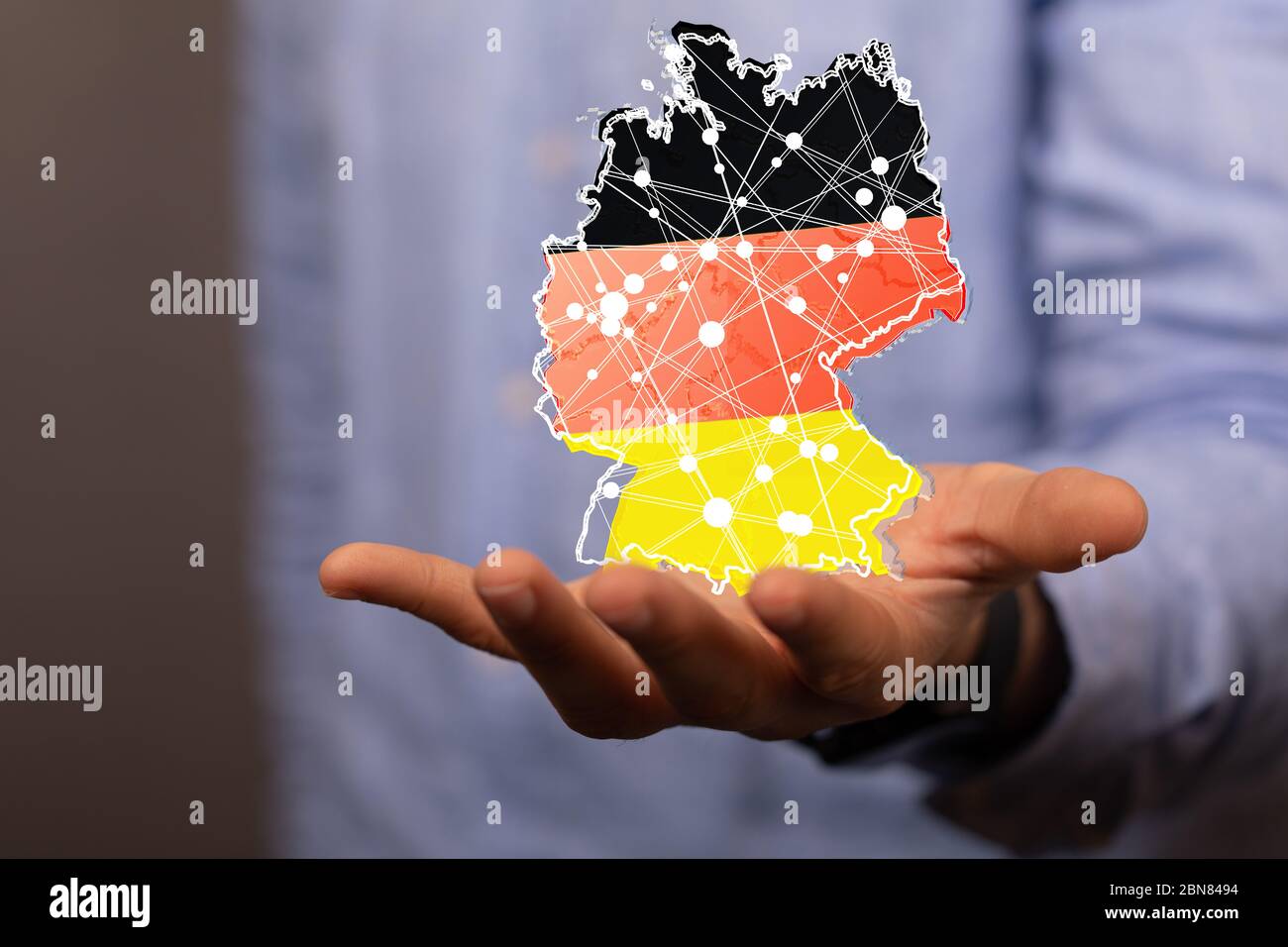 A germany map digital in hand 3d Stock Photo - Alamy