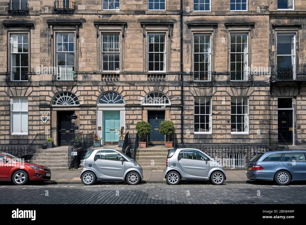 Cars parked outside properties on Heriot Row in Edinburgh's