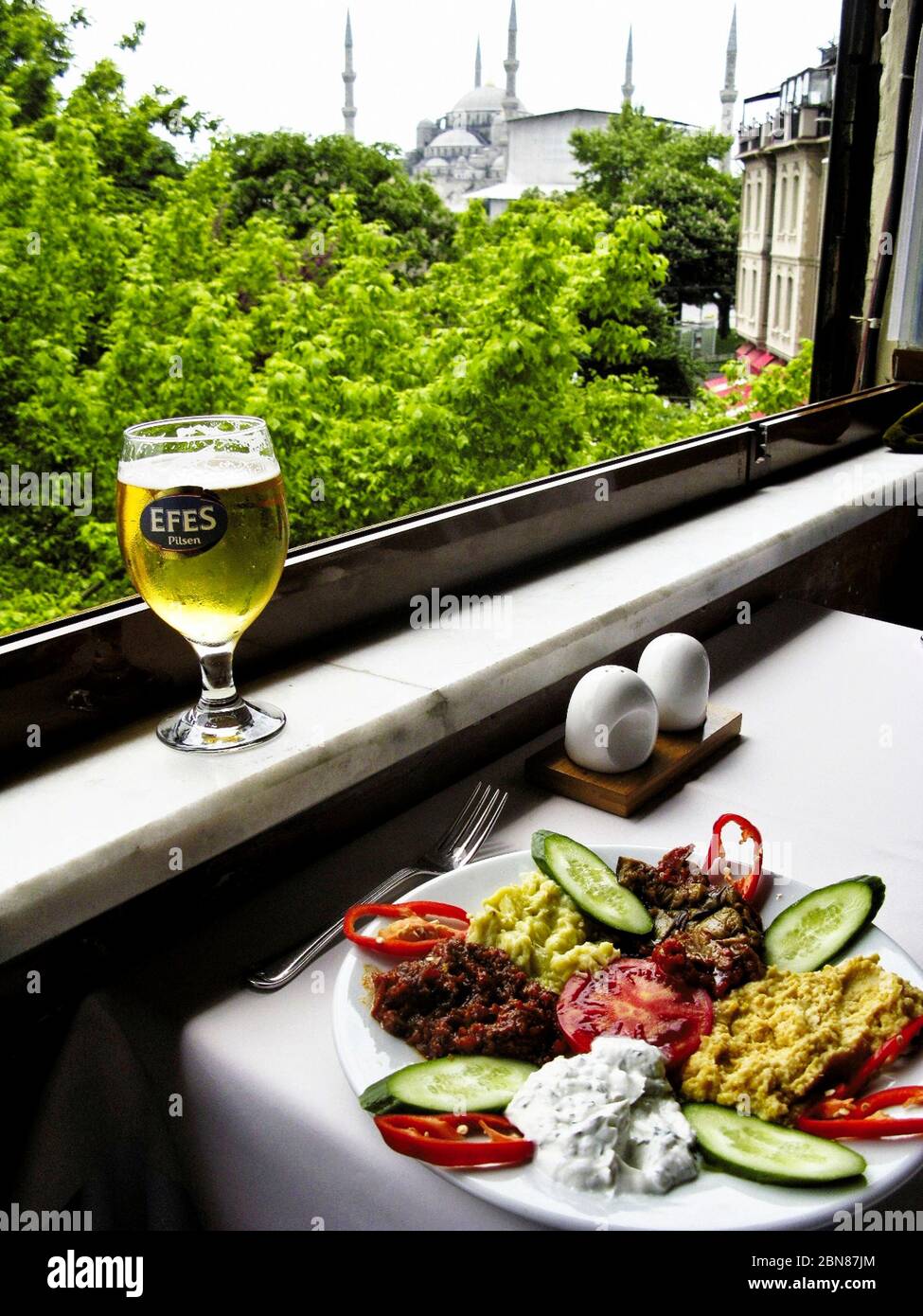 Turkish Cuisine. Meze and Efes Beer. Omar Restaurant, Sultanahmet, Istanbul, Turkey Stock Photo