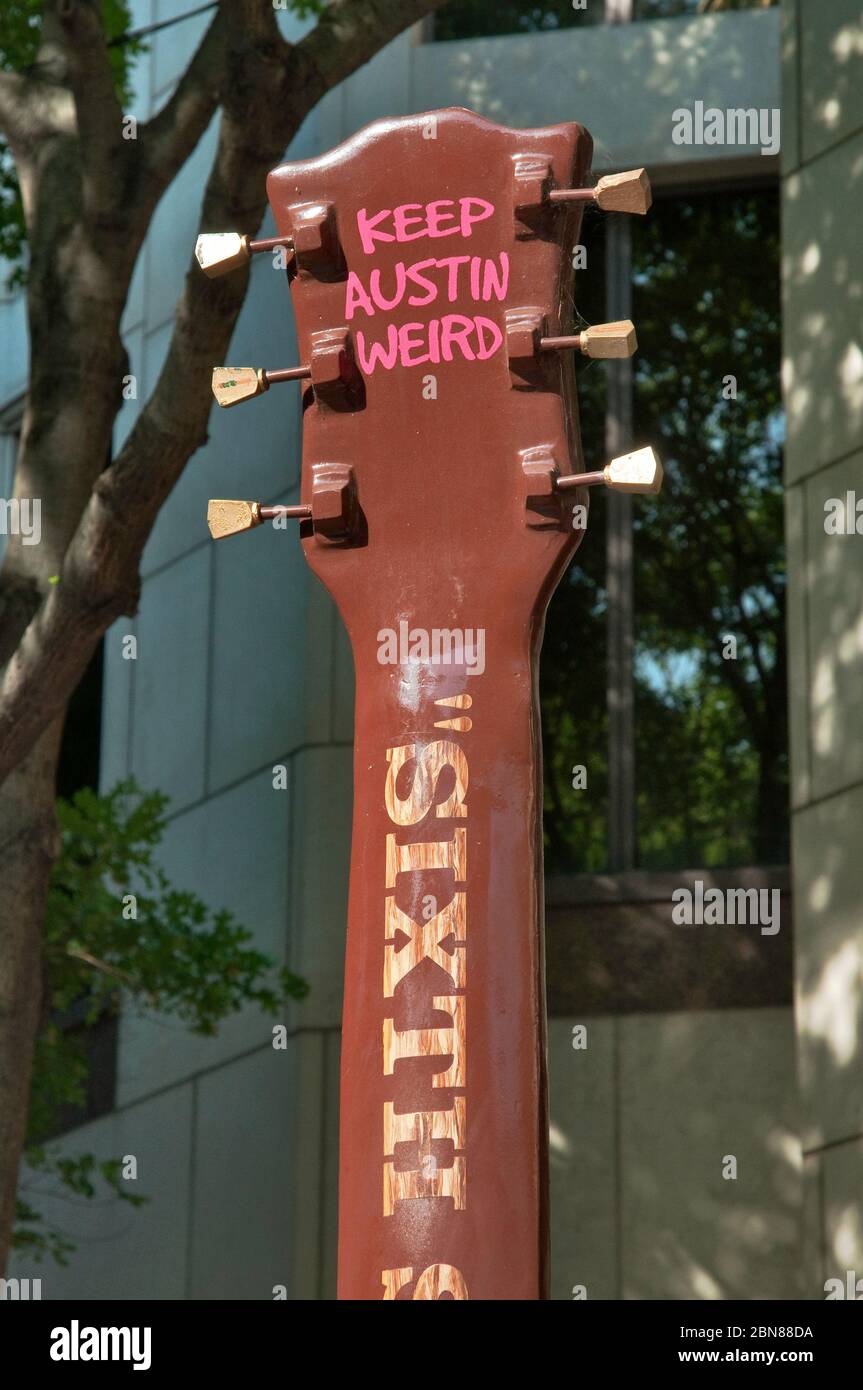 "Keep Austin weird" slogan at headstock of "Sixth String" guitar