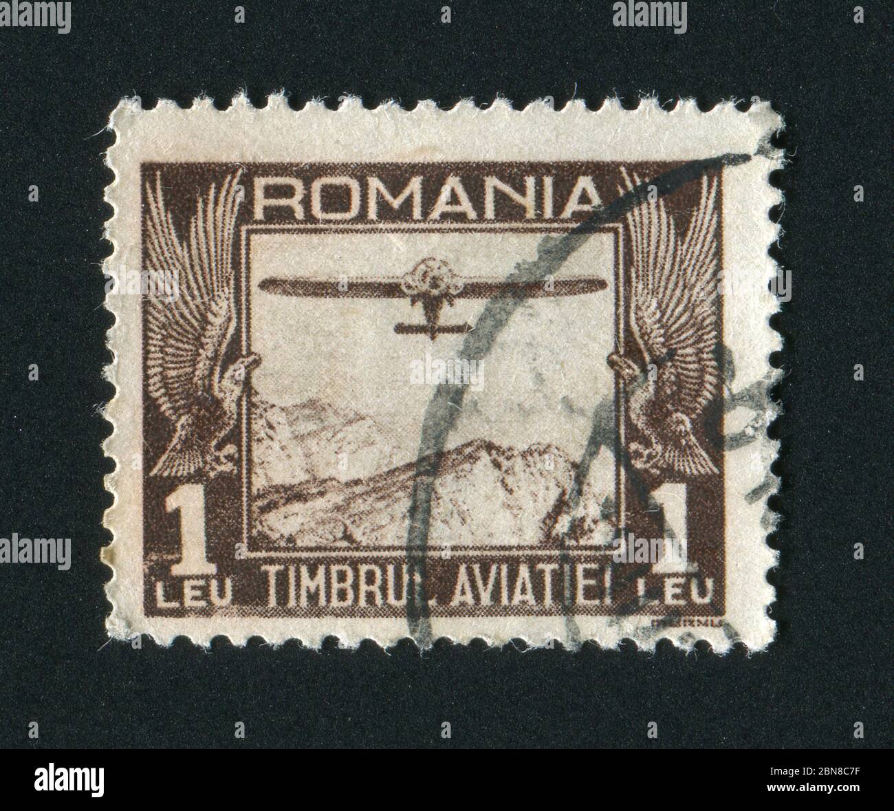 ROMANIA - CIRCA 1931: The flying plane an air mail symbol, circa 1931. Stock Photo