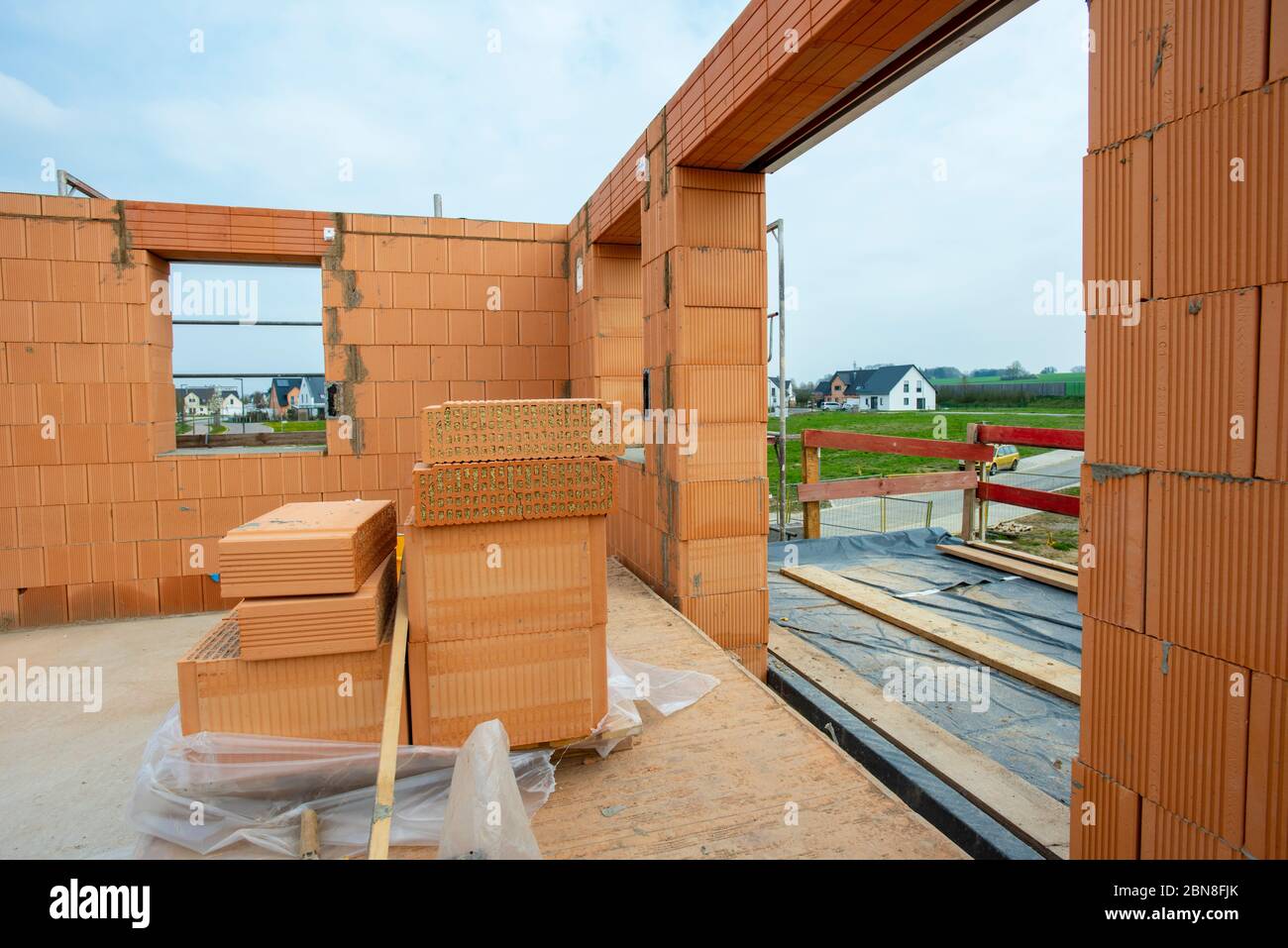 new built house in construction Stock Photo - Alamy