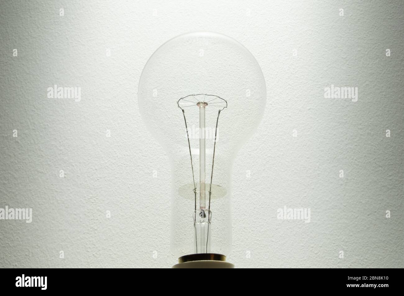 Lightbulb against white background concept of idea ideas thinking hmm light bulb bright idea Stock Photo