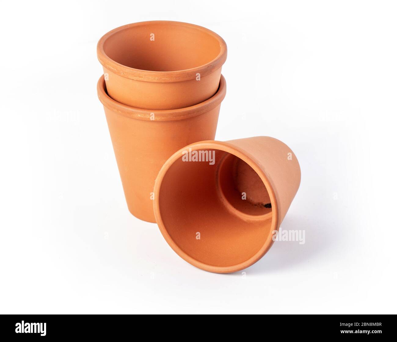 Empty ceramic brown flower pot isolated on white background, close up Stock Photo