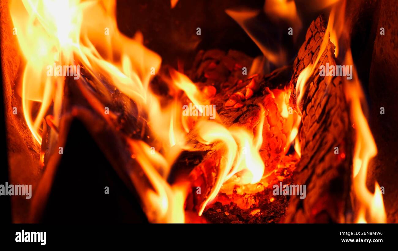 Red fire flames, burn wood in fireplace Stock Photo Alamy
