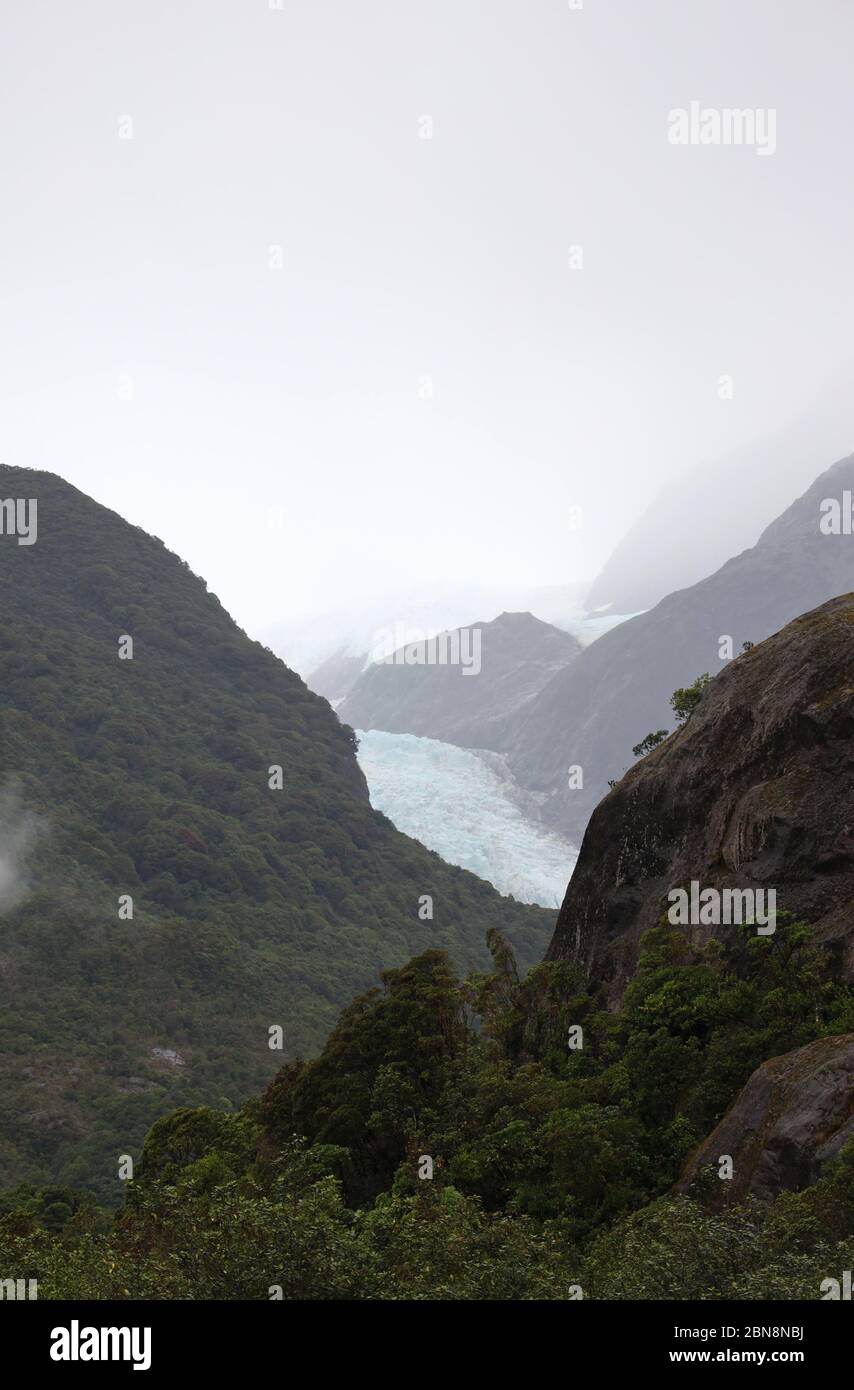 Fox Glacier. Ice clad glacial mountains of the Southern Alps, South Island, New Zealand. No people. Stock Photo