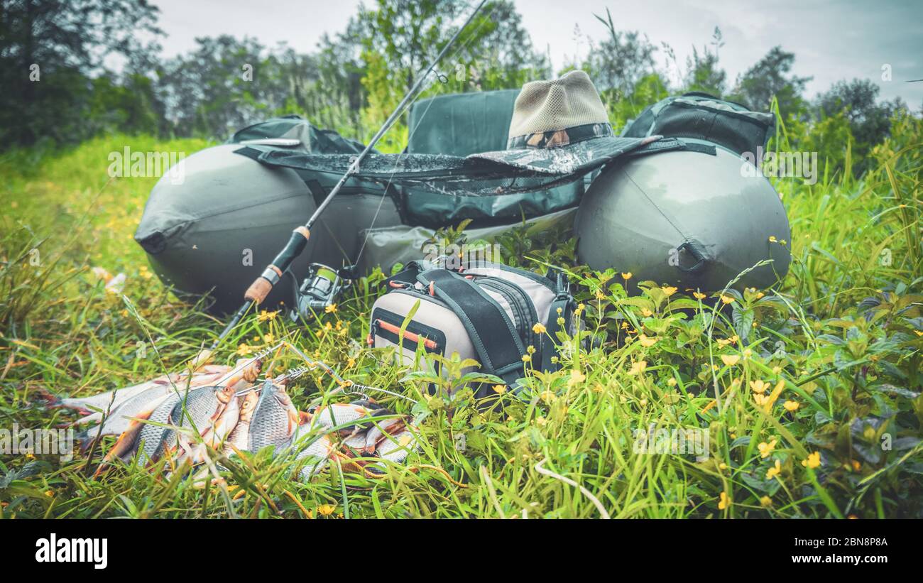 Fishing using the float tube Stock Photo Alamy
