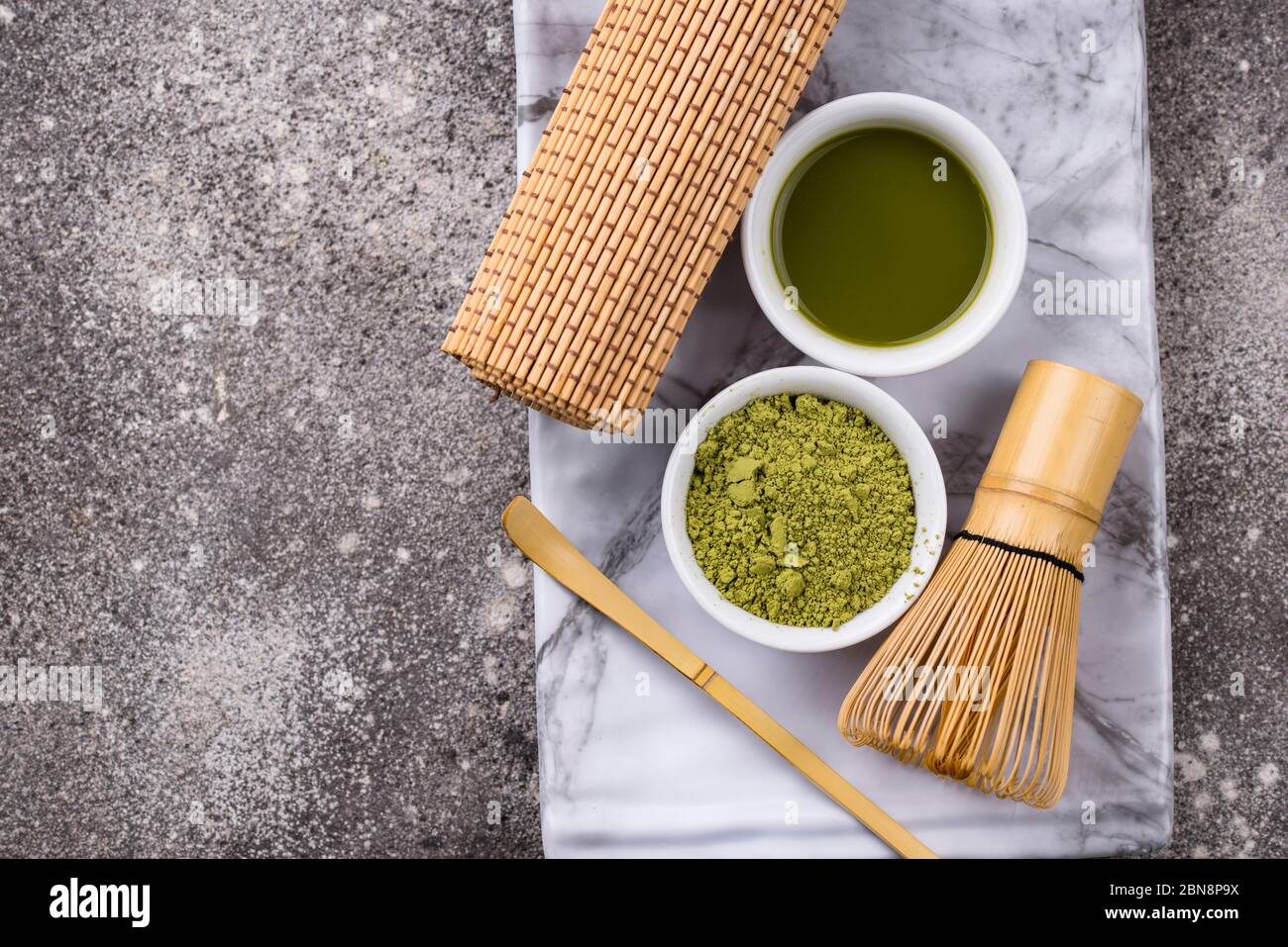 Matcha tea and bamboo whisk Stock Photo Alamy