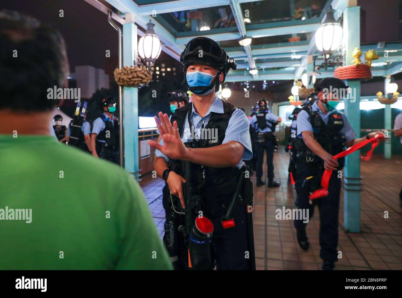 Police officers seen confronting with protesters during the protest.Pro-democracy protesters gather in different shopping malls on 13 May 2020, the day of Hong Kong chief executive Carrie Lam birthday. They demand investigation for the brutality actions carried out to the protesters by the Hong Kong police during last year's protests triggered by the extradition bill. Stock Photo