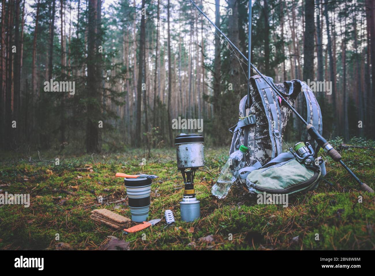 Cooking while hiking with a backpack Stock Photo - Alamy