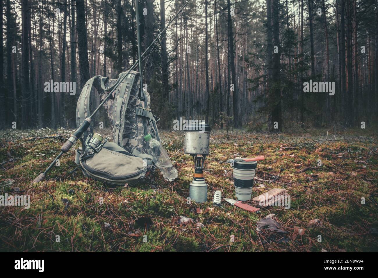 Cooking while hiking with a backpack Stock Photo - Alamy