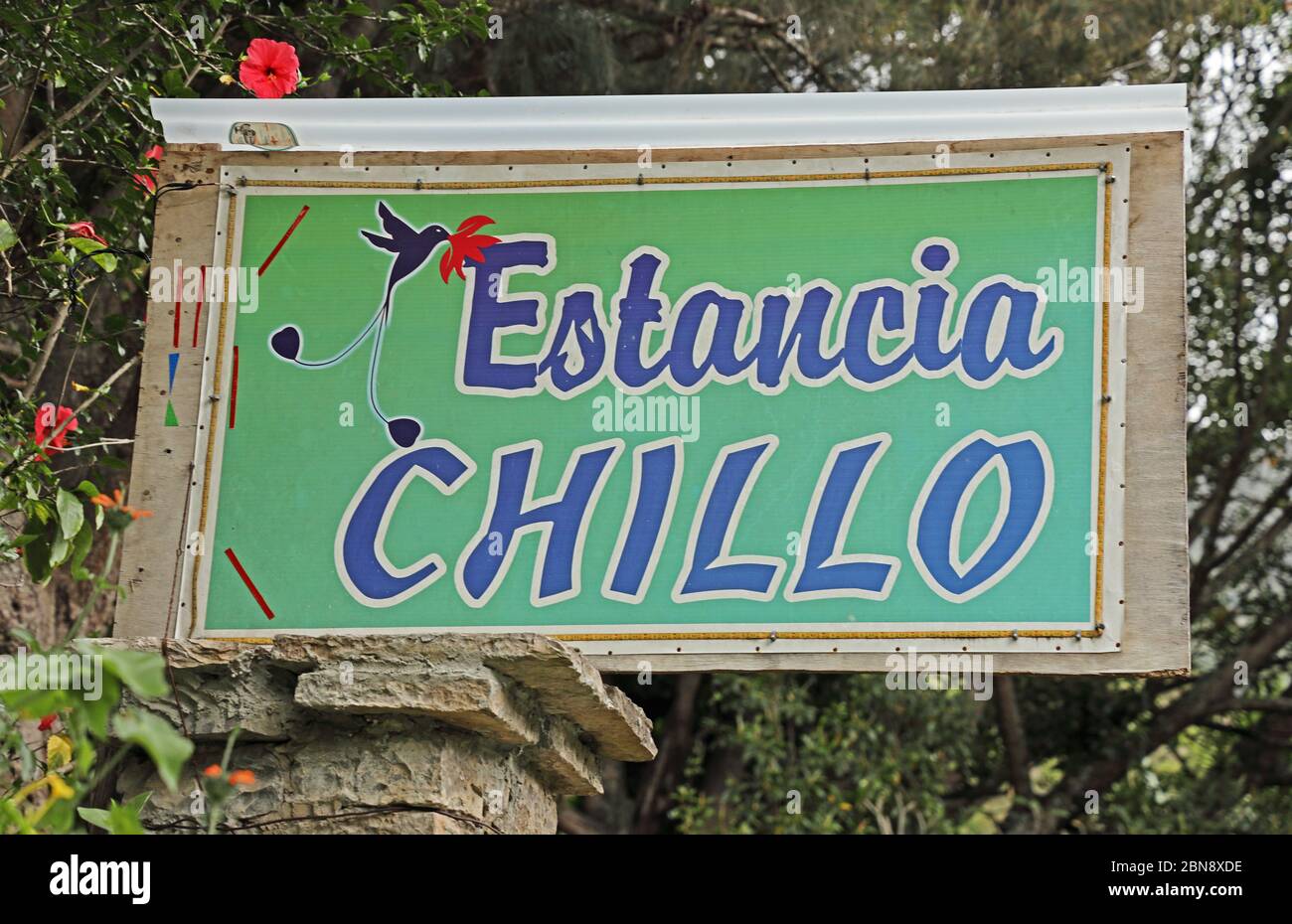 sign to house with illustration of Marvelous Spatuletail hummingbird  near Pedro Ruiz Gallo, Peru             February Stock Photo