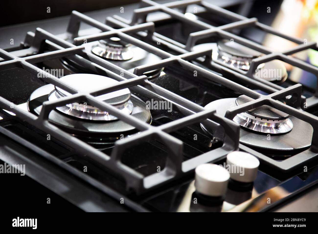 New Modern Gas Stove With Four Burners For The Kitchen Stainless Steel Surface Cast Iron Grates Stock Photo Alamy