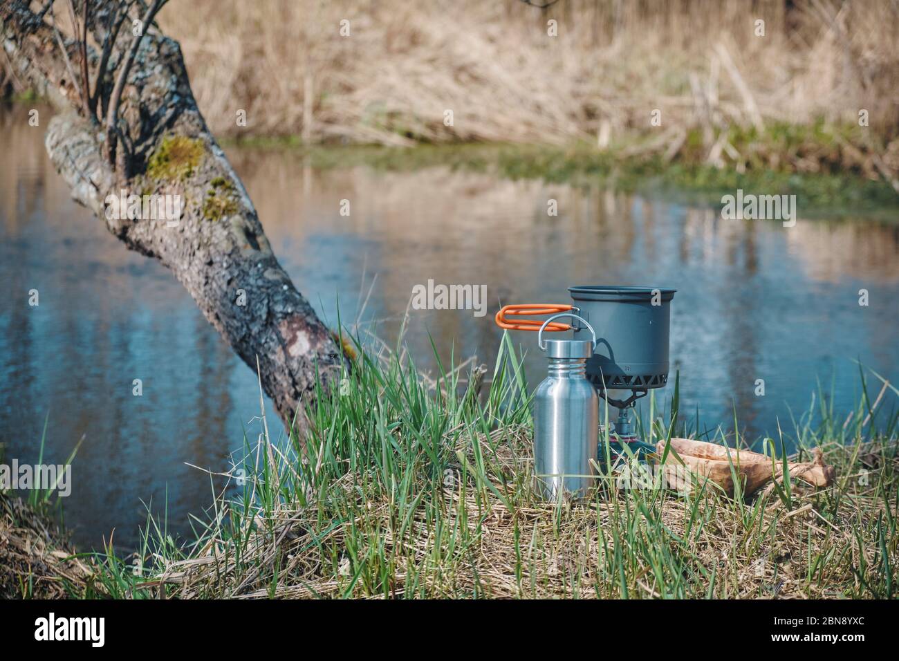Cooking while hiking with a backpack Stock Photo - Alamy