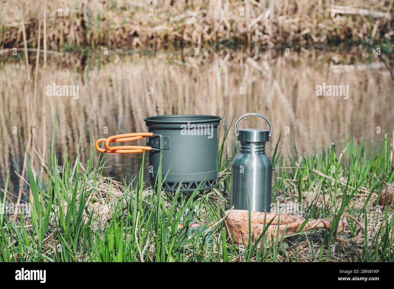 Cooking while hiking with a backpack Stock Photo - Alamy