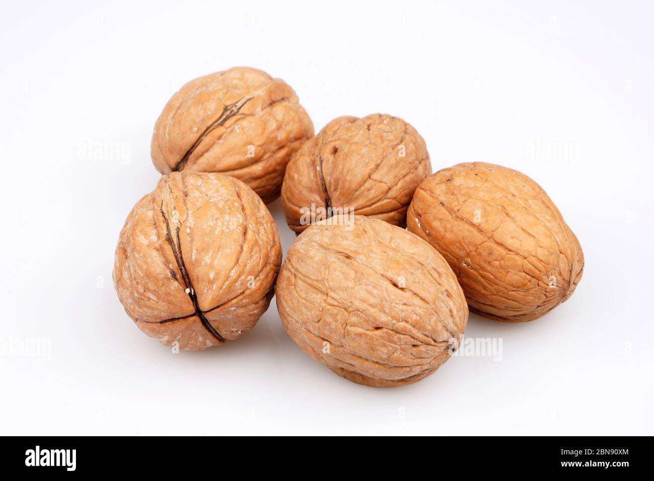 Some Organic walnut on white background. Top view Stock Photo