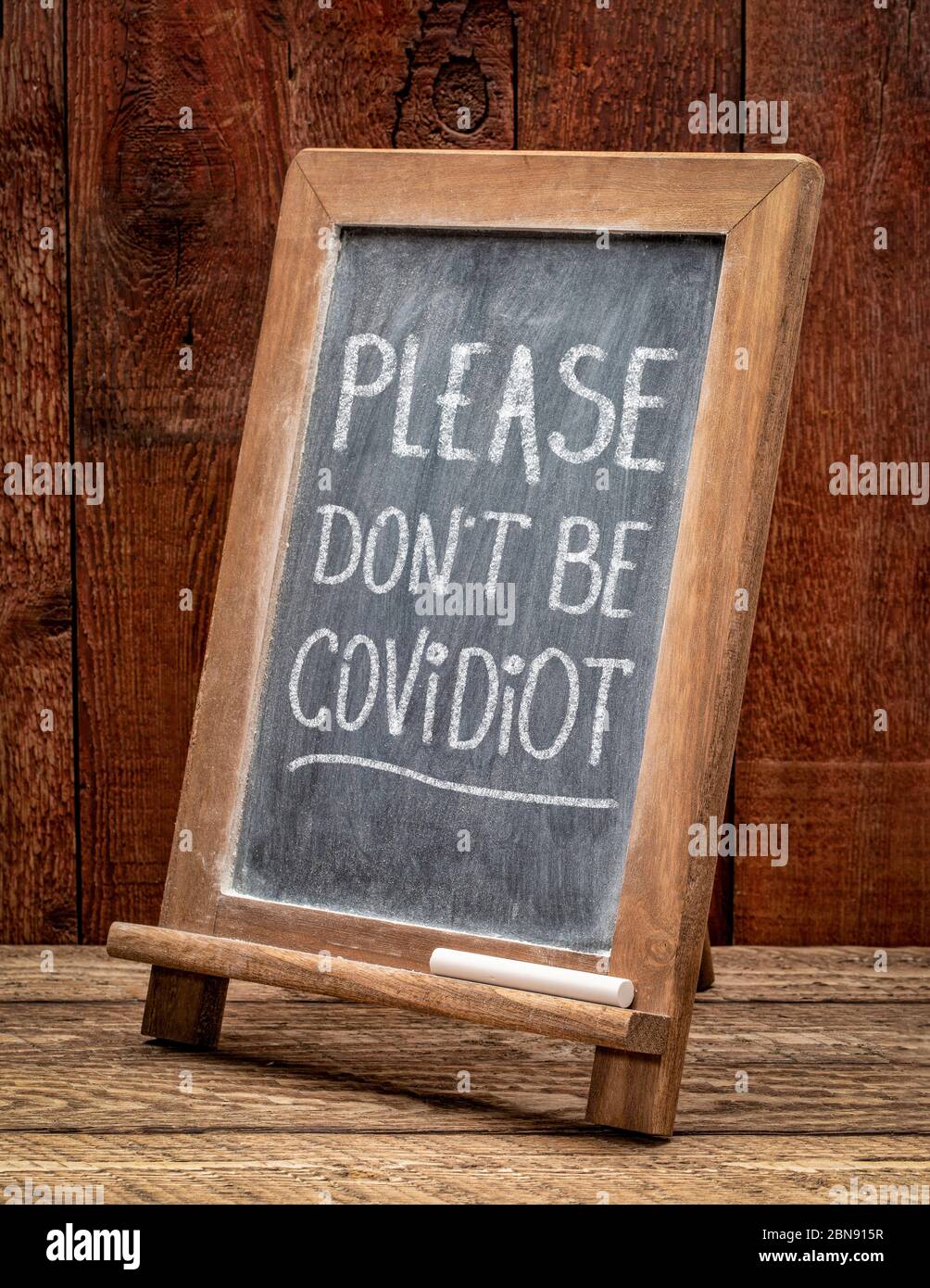 please do not be covidiot -someone who ignores the warnings regarding public health or safety or social distancing during coronavirus covid-19 pandemi Stock Photo