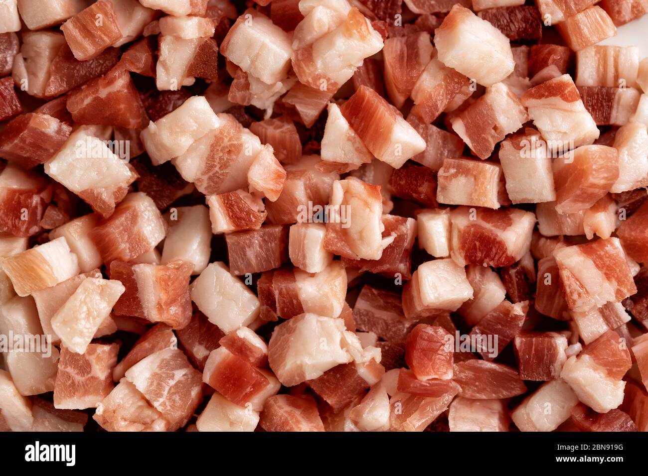 Italian pancetta, bacon cubes, diced ham, cutted pork texture