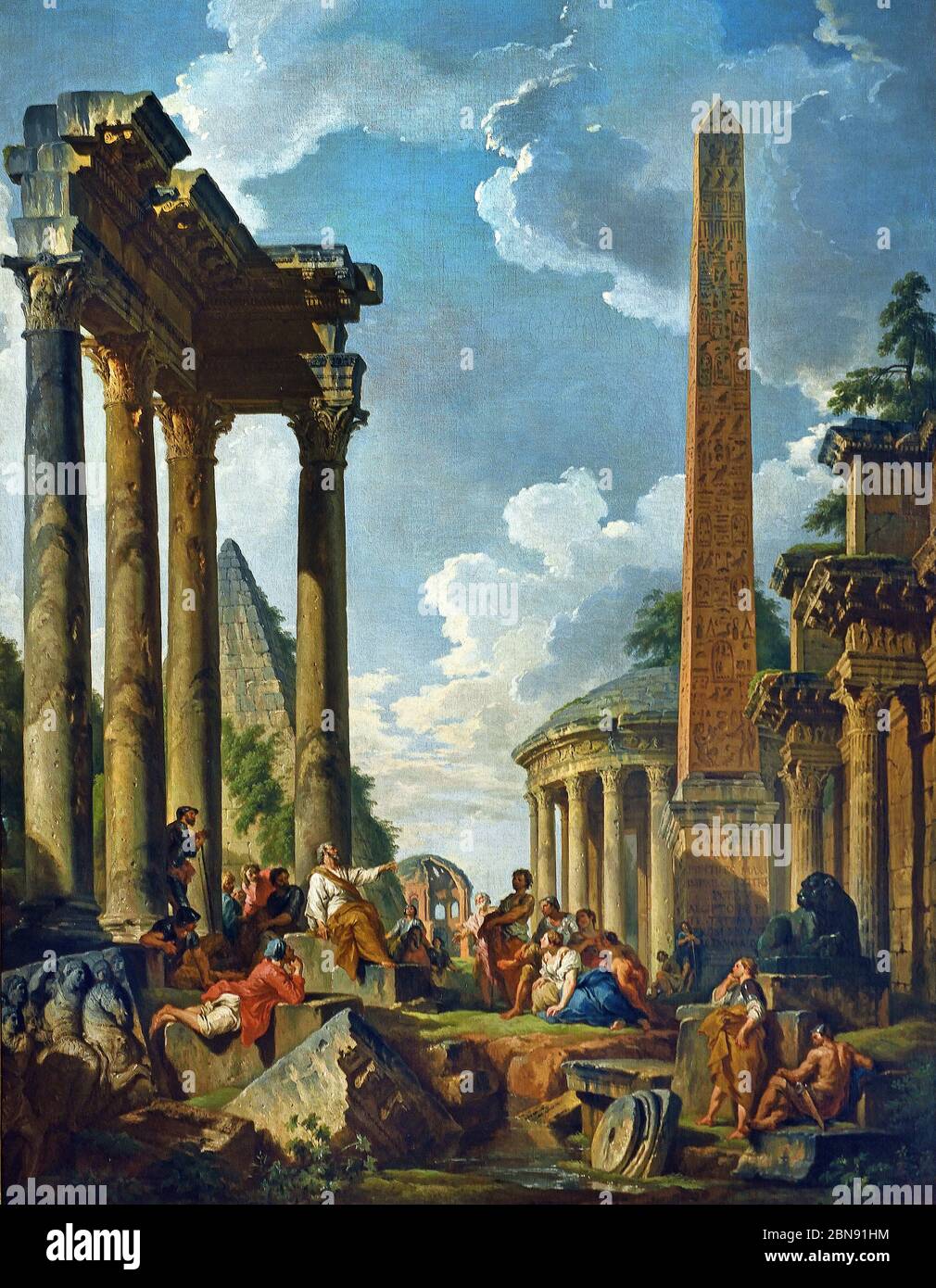 Capriccio of Roman Ruins with a Preacher,  1745–50, by Giovanni Paolo PANINI.  Piacenza, 1691 – Rome, 1765,  Italy, Italian, ( The pyramid of Caius Cestius, the temple of Minerva Medica, a circular building combining the Temple of Vesta and Temple of the Sybil in Tivoli, the obelisk of Augustus (Piazza del Popolo), and the colonnacce of the Forum of Nerva.) Stock Photo