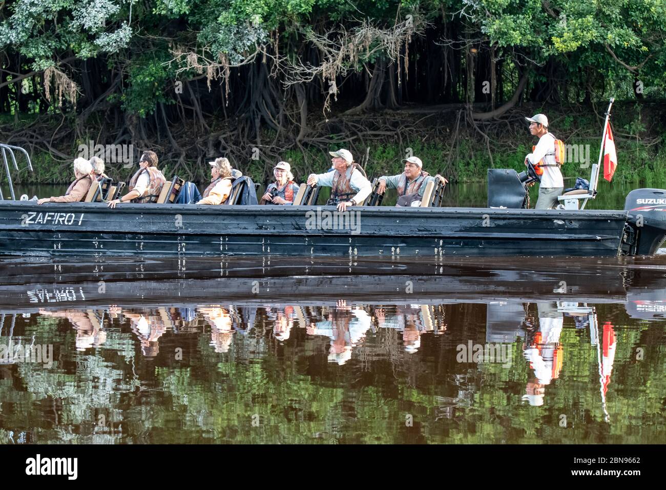 Wildlife safari boat ride on the Peruvian Amazon Stock Photo