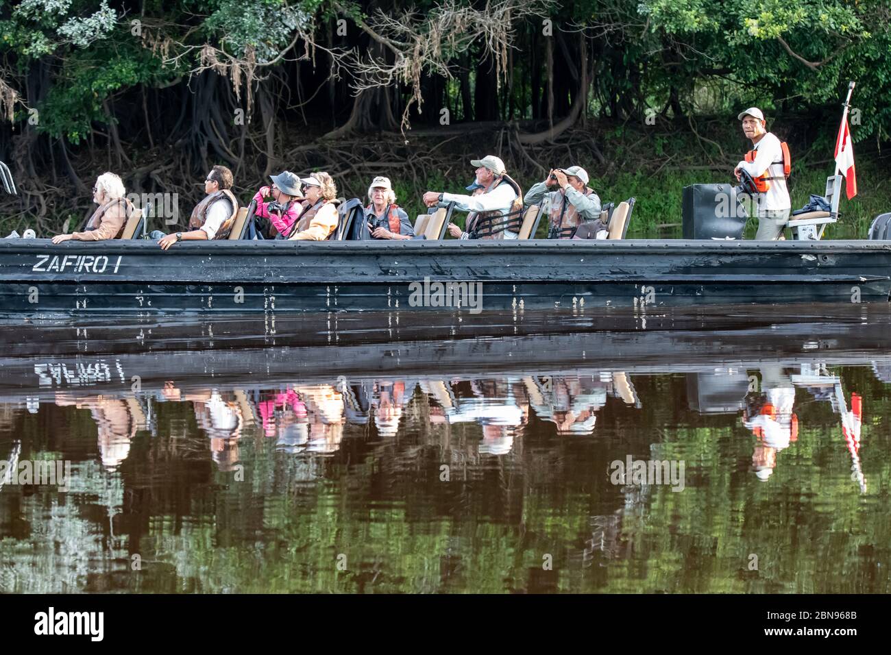 Wildlife safari boat ride on the Peruvian Amazon Stock Photo