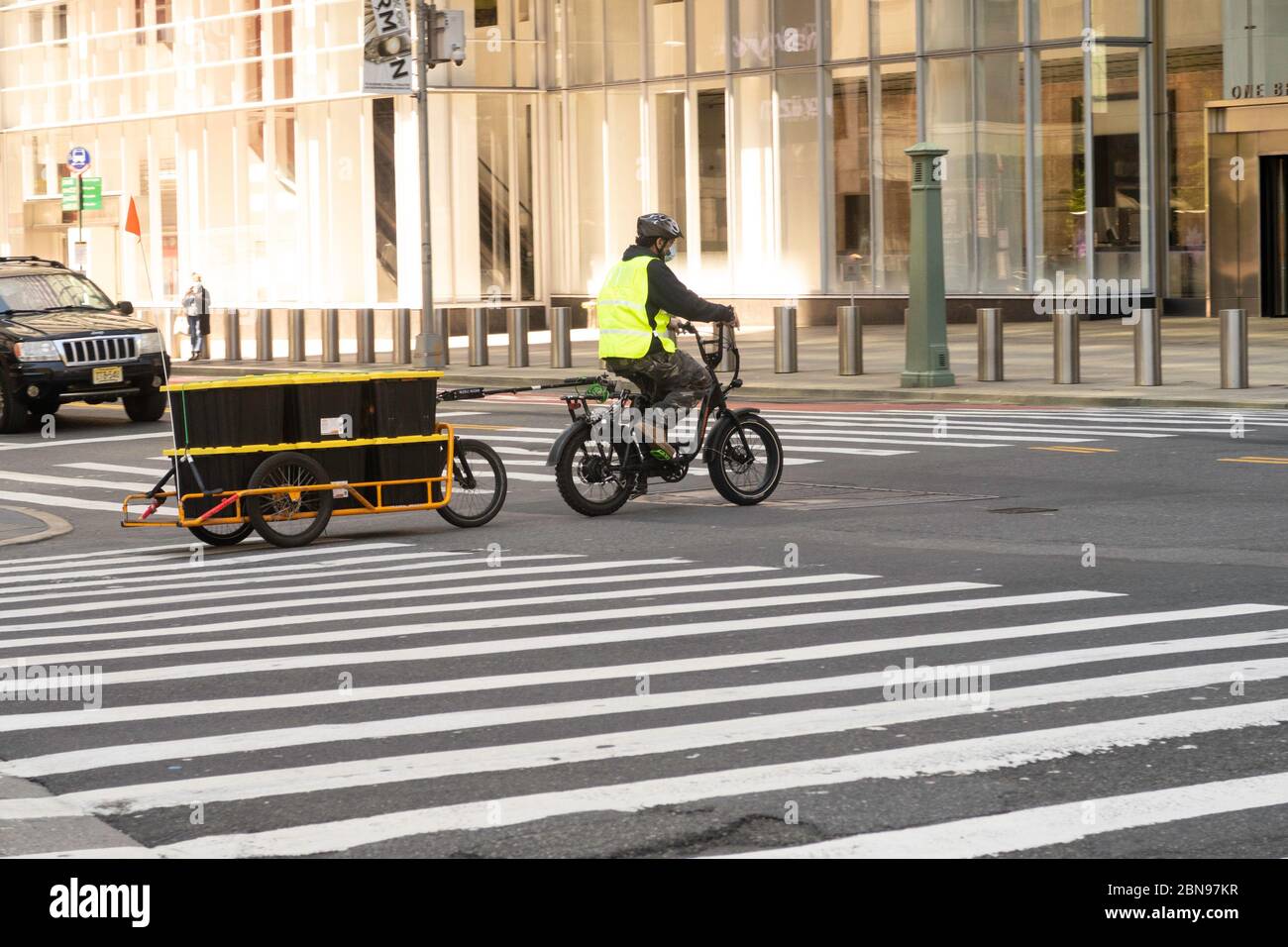 Whole Foods Market employs Carla Cargo trailer with ebike for food delivery in Midtown
