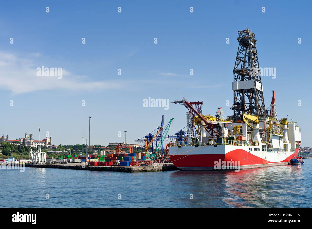 Container cargo ship loading in commercial dock port. Logistic and ...