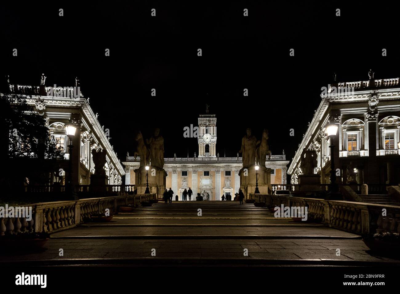 Rome, Italy: Senatorio Palace in Campidoglio square in Rome by night whith Capitoline museums on both sides and the staircase in close-up Stock Photo