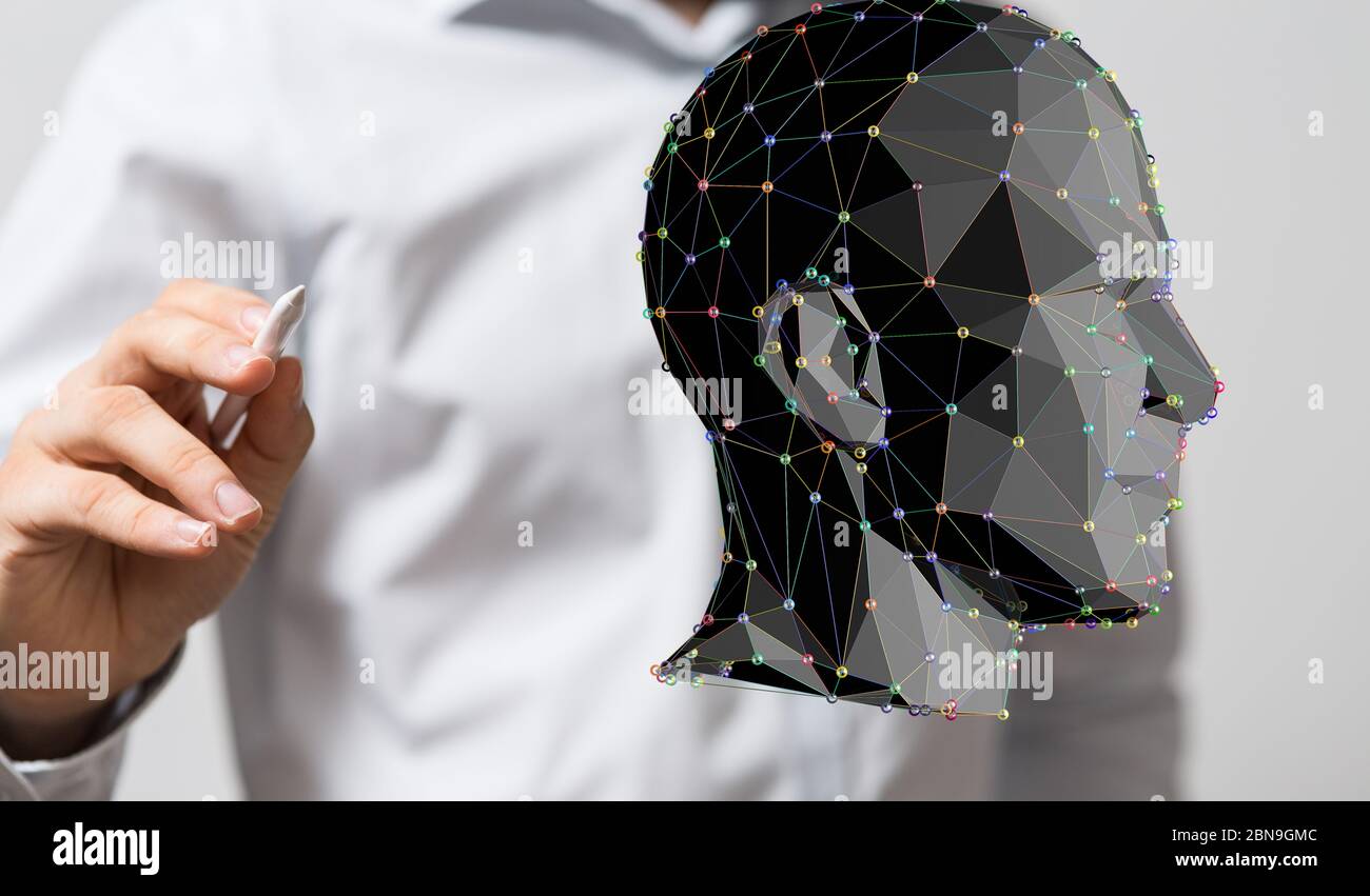 A head with symbol neurons in brain Stock Photo