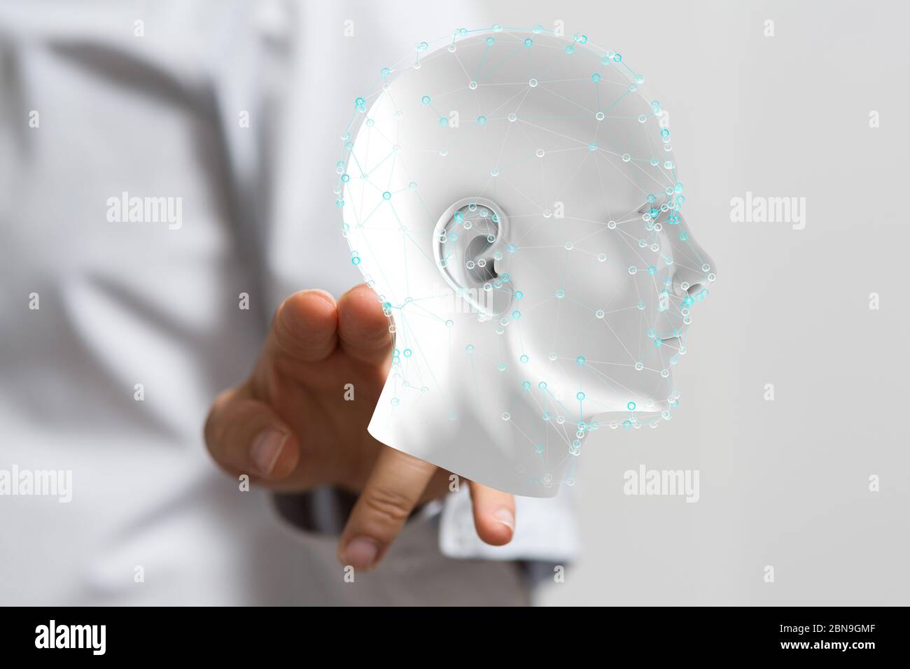 A head with symbol neurons in brain Stock Photo