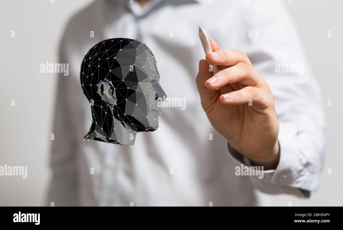 A head with symbol neurons in brain Stock Photo
